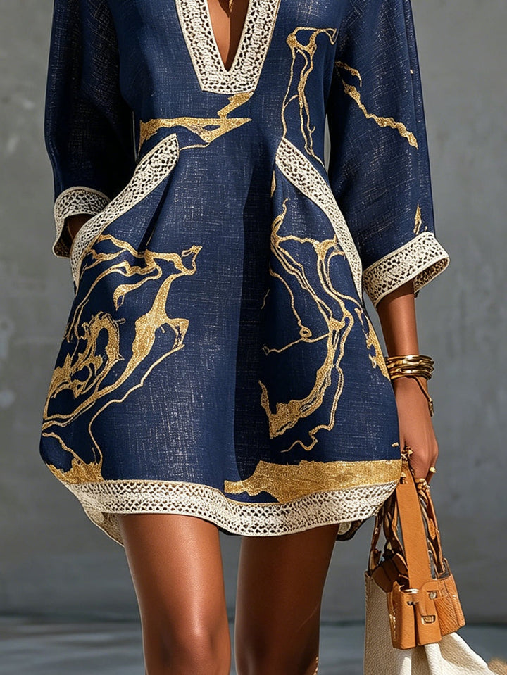 Cosette | Mini Dress in Navy Blue Crocheted Lace with Golden Patterns and V-Neck