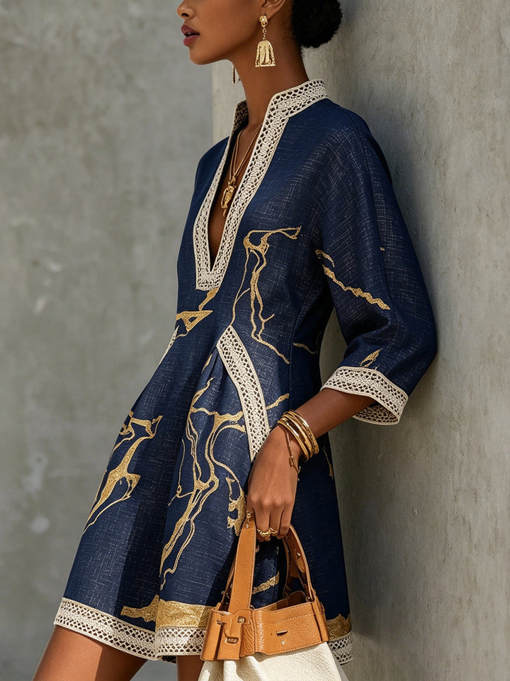 Cosette | Mini Dress in Navy Blue Crocheted Lace with Golden Patterns and V-Neck